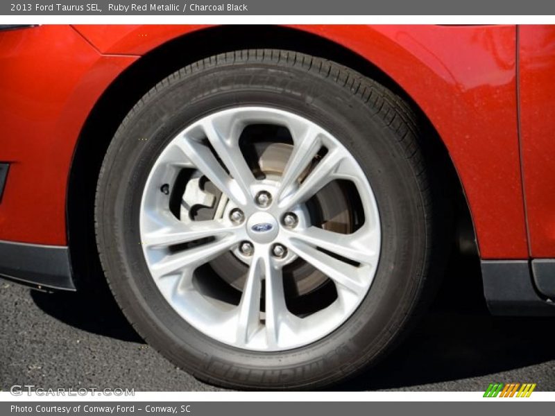 Ruby Red Metallic / Charcoal Black 2013 Ford Taurus SEL