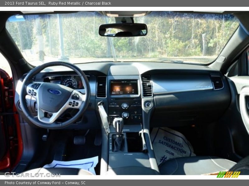Ruby Red Metallic / Charcoal Black 2013 Ford Taurus SEL