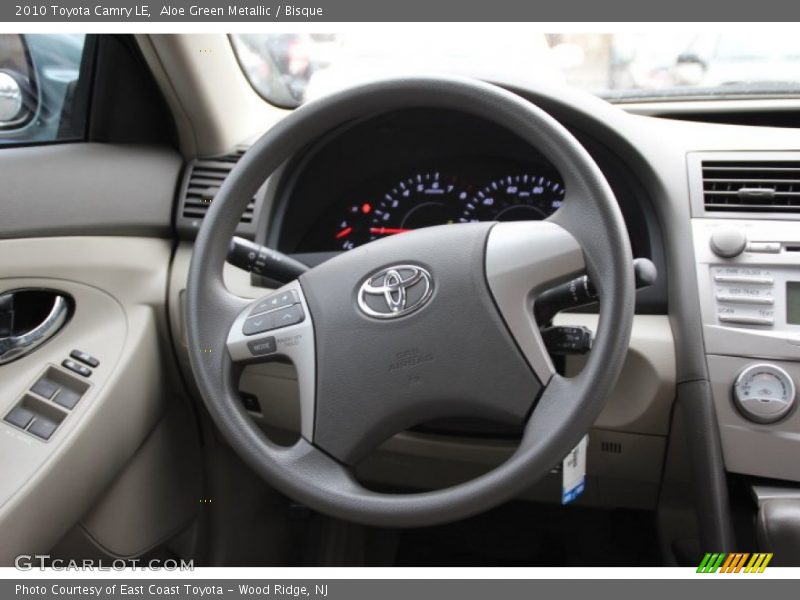 Aloe Green Metallic / Bisque 2010 Toyota Camry LE