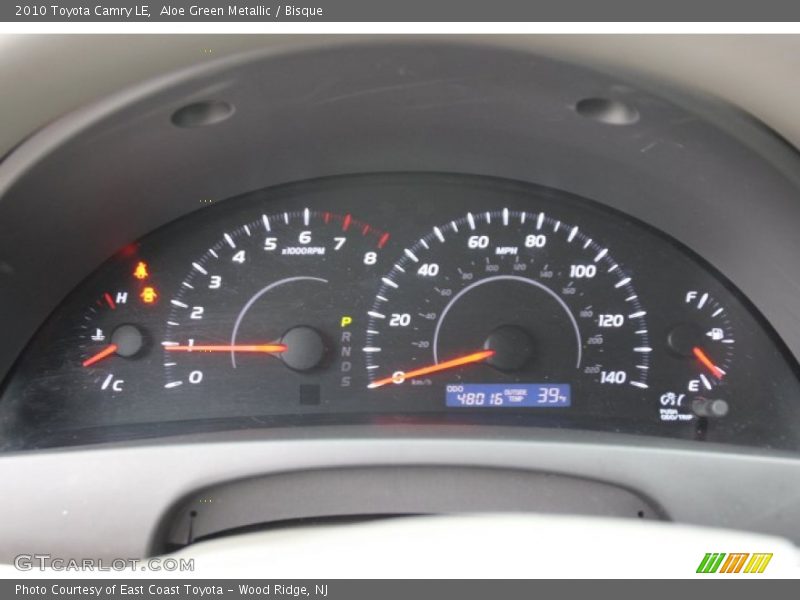 Aloe Green Metallic / Bisque 2010 Toyota Camry LE