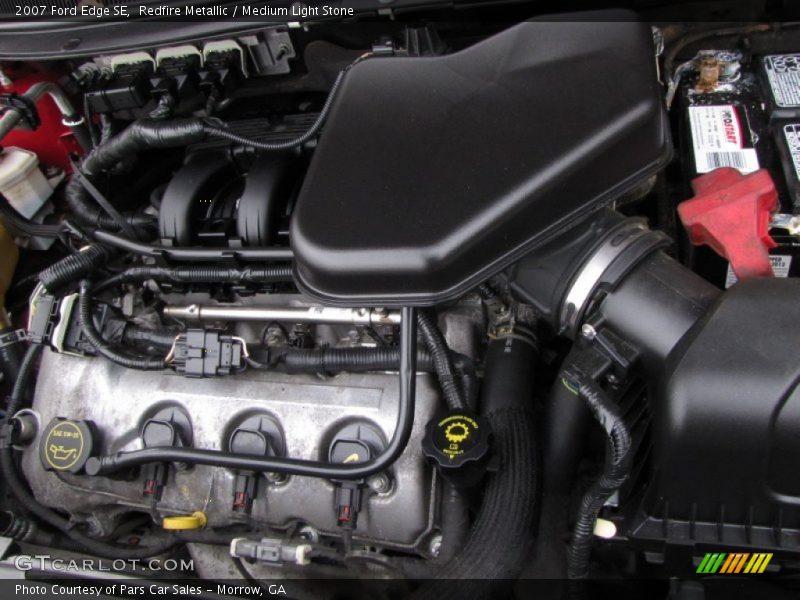 Redfire Metallic / Medium Light Stone 2007 Ford Edge SE