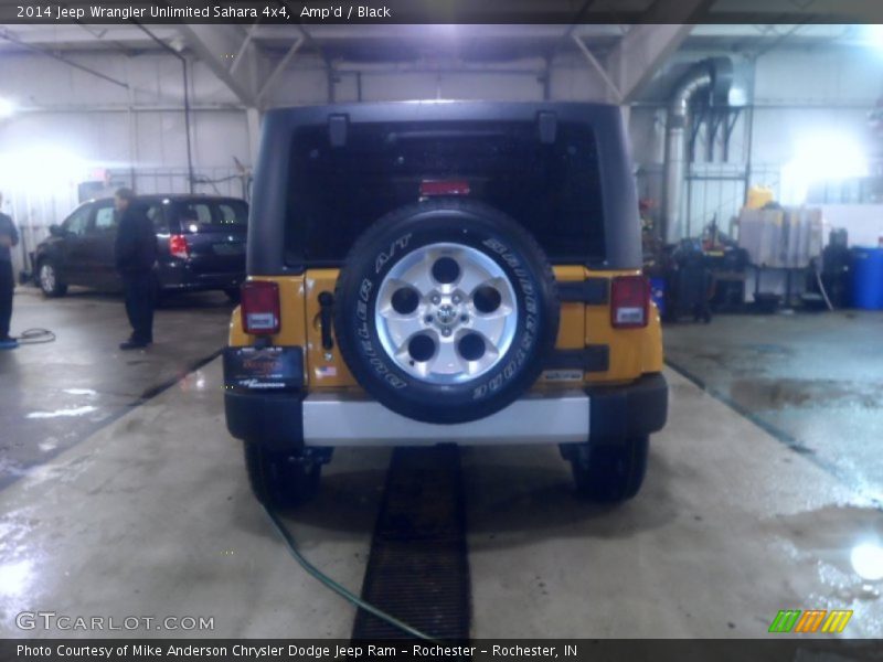 Amp'd / Black 2014 Jeep Wrangler Unlimited Sahara 4x4