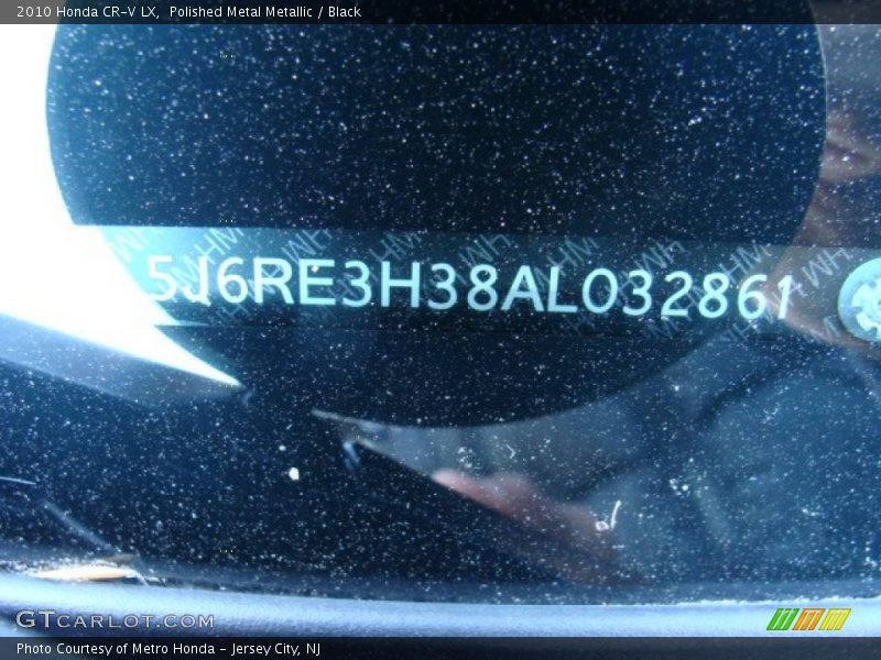 Polished Metal Metallic / Black 2010 Honda CR-V LX