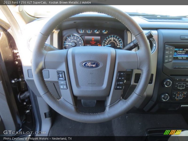 Kodiak Brown Metallic / Adobe 2013 Ford F150 XLT SuperCab