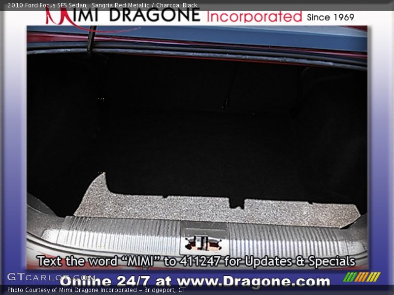 Sangria Red Metallic / Charcoal Black 2010 Ford Focus SES Sedan