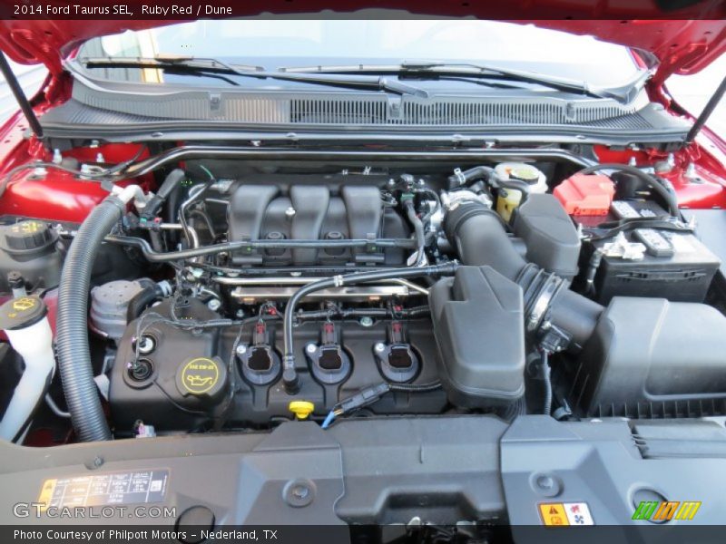 Ruby Red / Dune 2014 Ford Taurus SEL