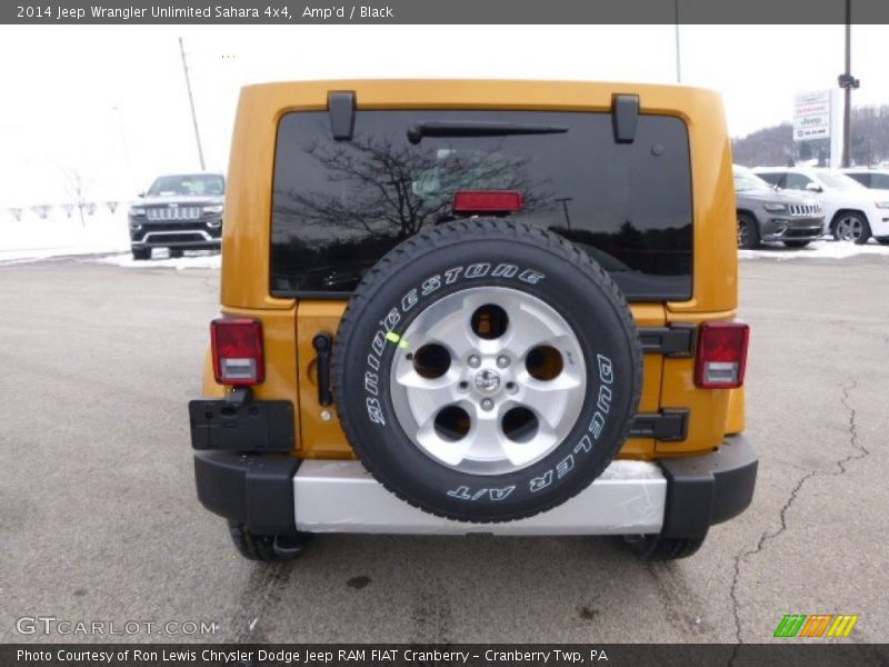 Amp'd / Black 2014 Jeep Wrangler Unlimited Sahara 4x4