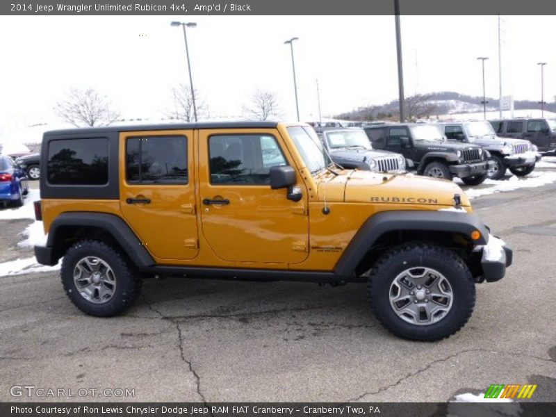 Amp'd / Black 2014 Jeep Wrangler Unlimited Rubicon 4x4