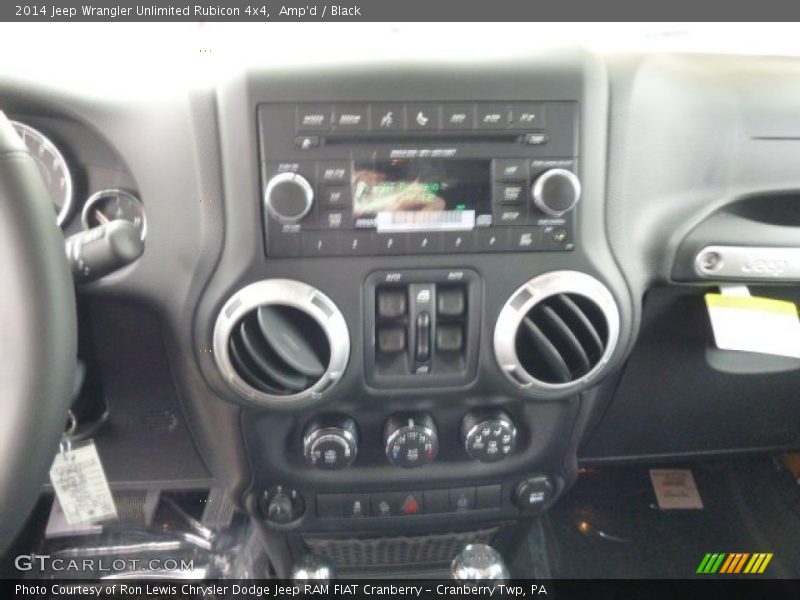 Amp'd / Black 2014 Jeep Wrangler Unlimited Rubicon 4x4