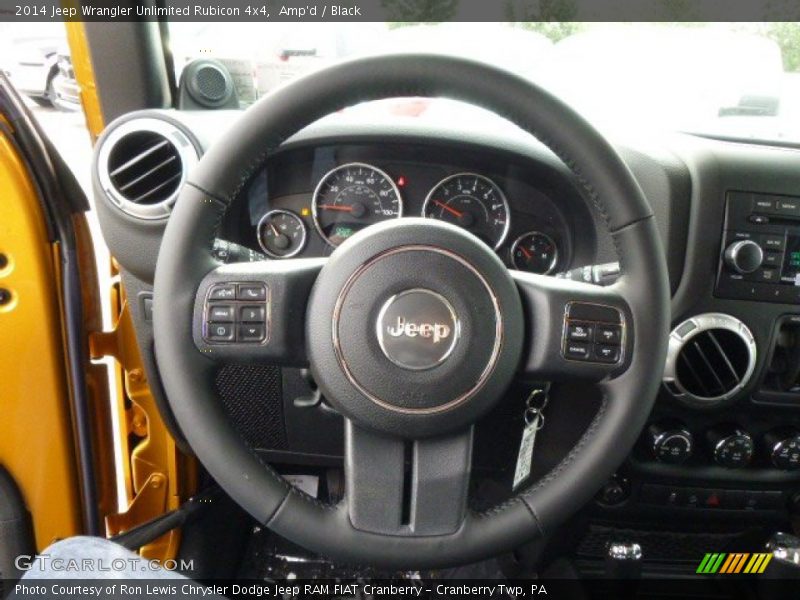 Amp'd / Black 2014 Jeep Wrangler Unlimited Rubicon 4x4