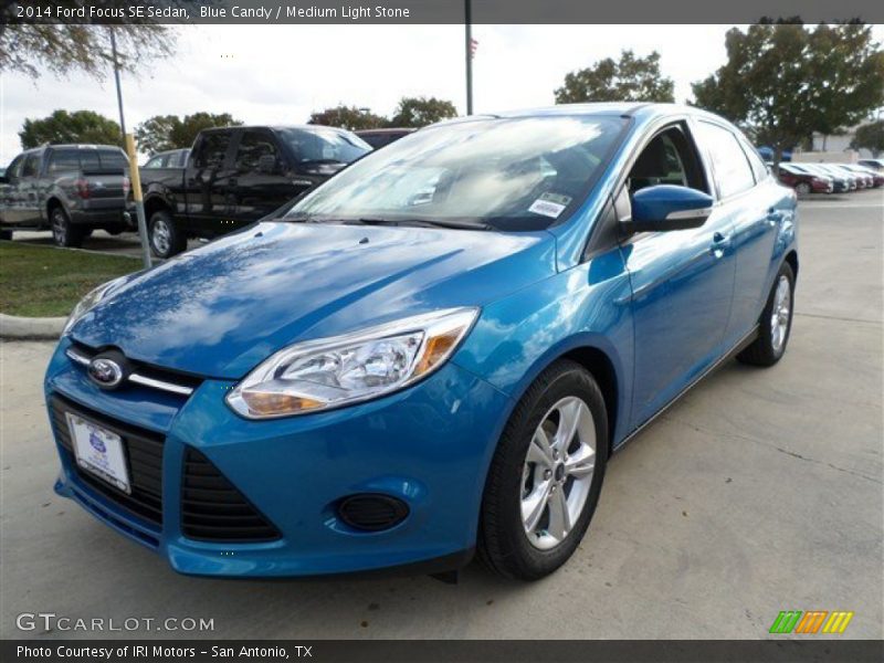 Blue Candy / Medium Light Stone 2014 Ford Focus SE Sedan