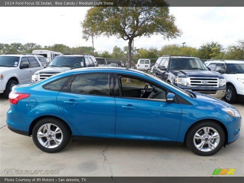 Blue Candy / Medium Light Stone 2014 Ford Focus SE Sedan