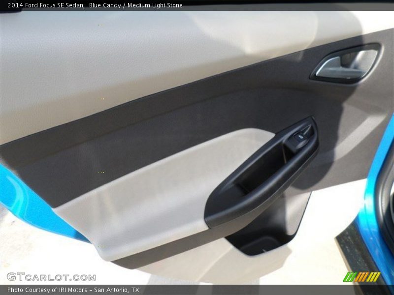 Blue Candy / Medium Light Stone 2014 Ford Focus SE Sedan