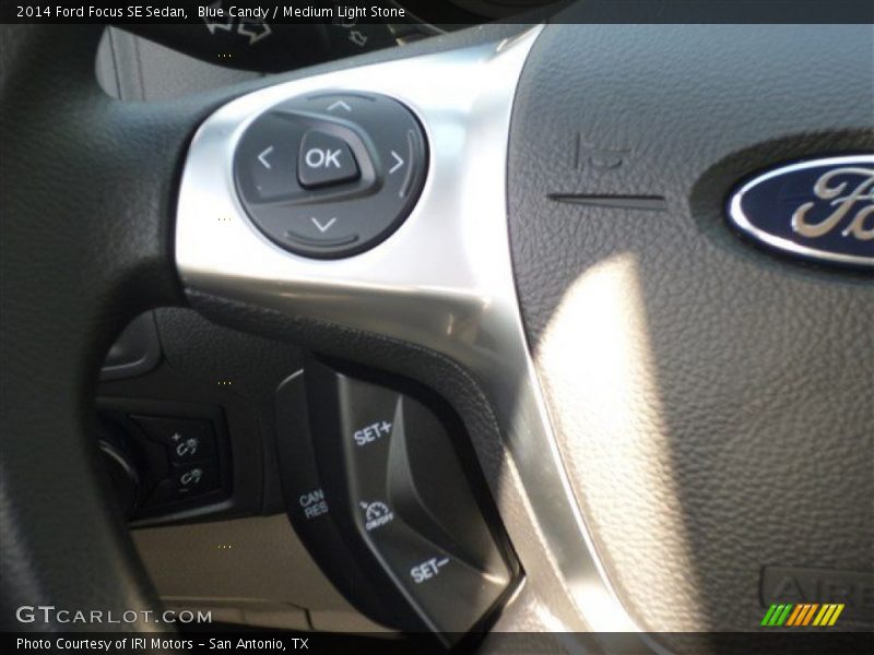 Blue Candy / Medium Light Stone 2014 Ford Focus SE Sedan