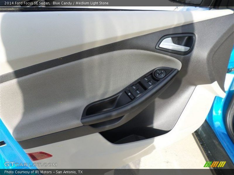 Blue Candy / Medium Light Stone 2014 Ford Focus SE Sedan