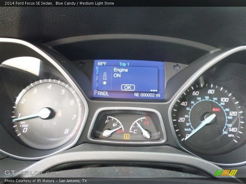 Blue Candy / Medium Light Stone 2014 Ford Focus SE Sedan