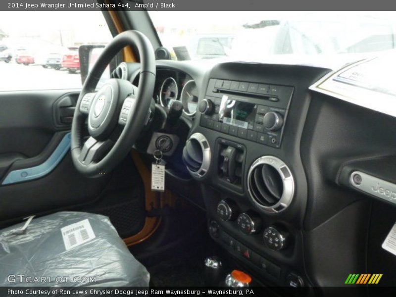 Amp'd / Black 2014 Jeep Wrangler Unlimited Sahara 4x4