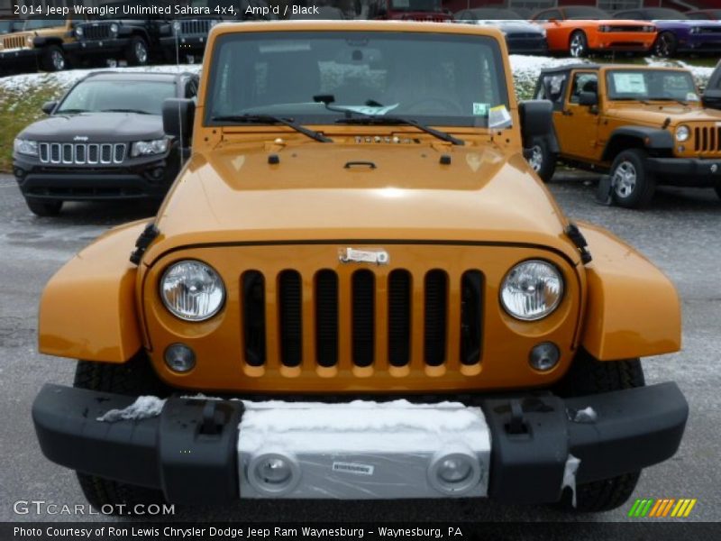 Amp'd / Black 2014 Jeep Wrangler Unlimited Sahara 4x4