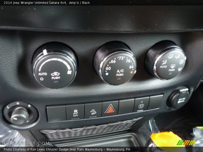 Amp'd / Black 2014 Jeep Wrangler Unlimited Sahara 4x4