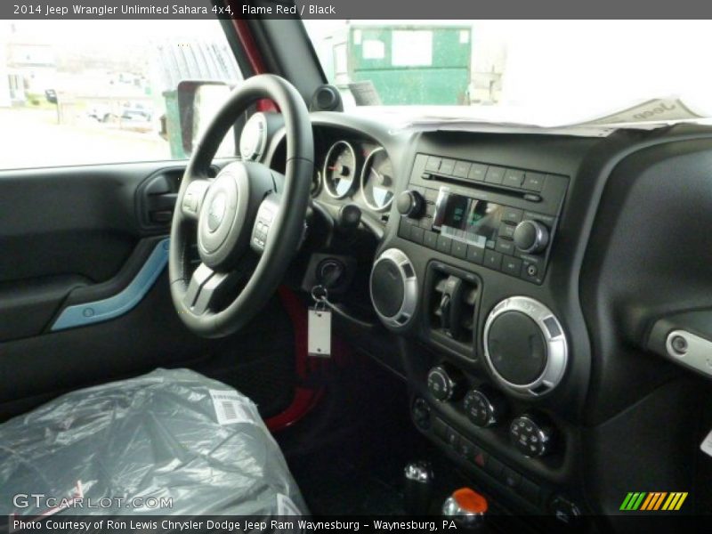 Flame Red / Black 2014 Jeep Wrangler Unlimited Sahara 4x4
