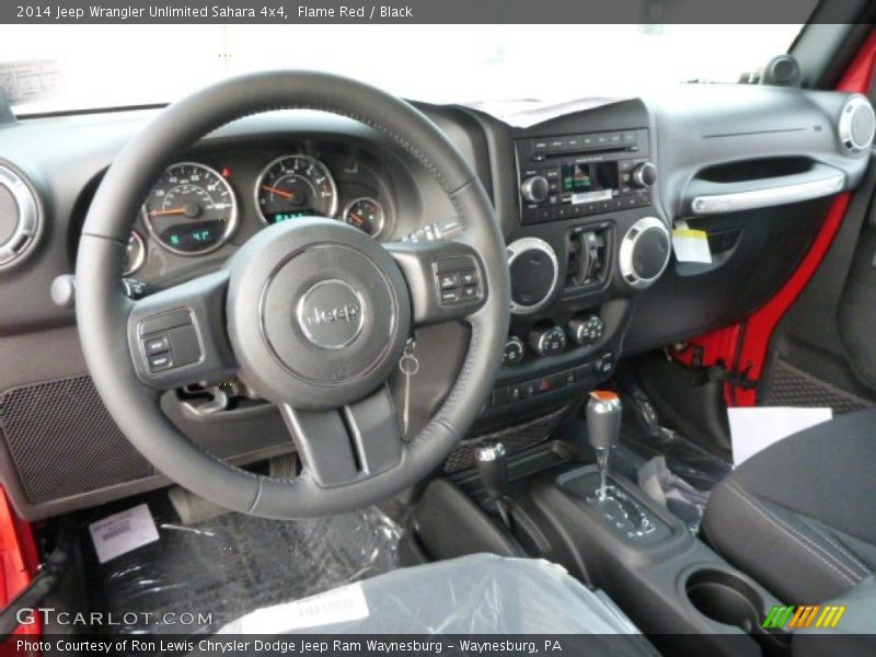 Flame Red / Black 2014 Jeep Wrangler Unlimited Sahara 4x4