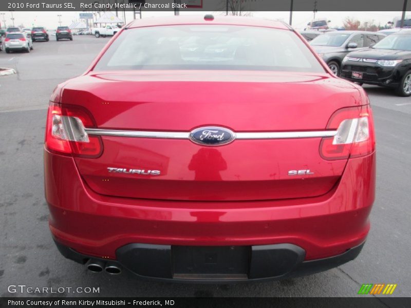 Red Candy Metallic / Charcoal Black 2010 Ford Taurus SEL
