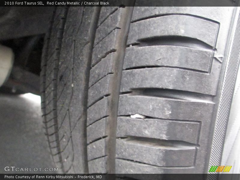 Red Candy Metallic / Charcoal Black 2010 Ford Taurus SEL