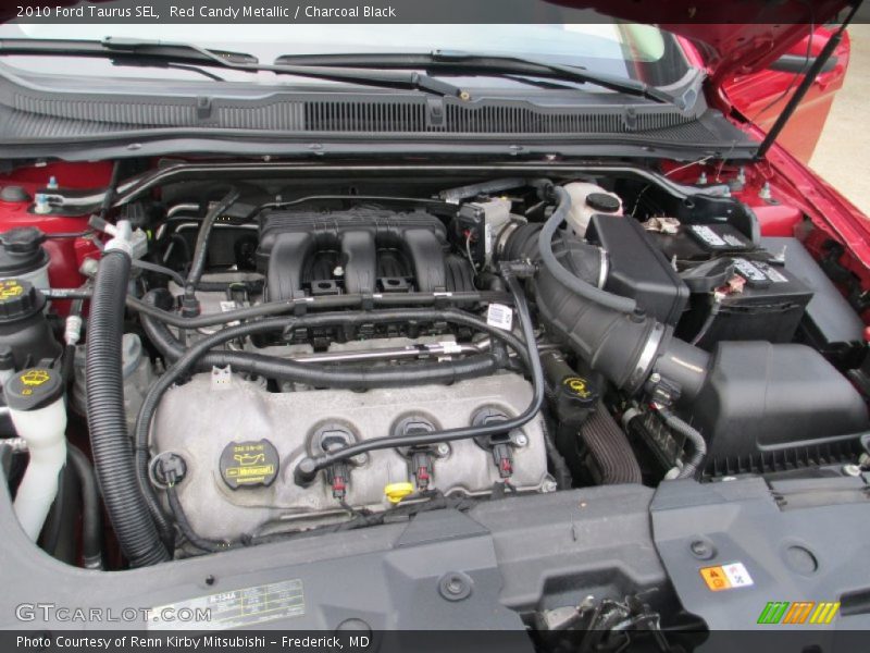 Red Candy Metallic / Charcoal Black 2010 Ford Taurus SEL