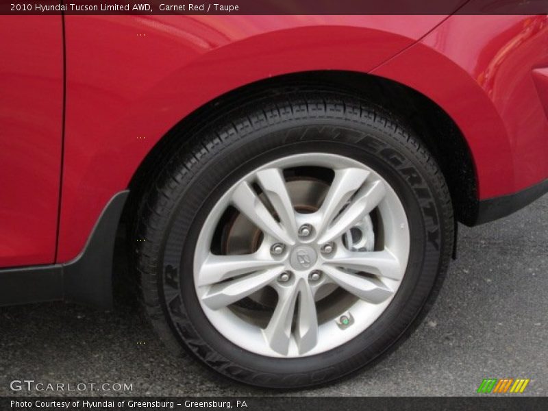 Garnet Red / Taupe 2010 Hyundai Tucson Limited AWD