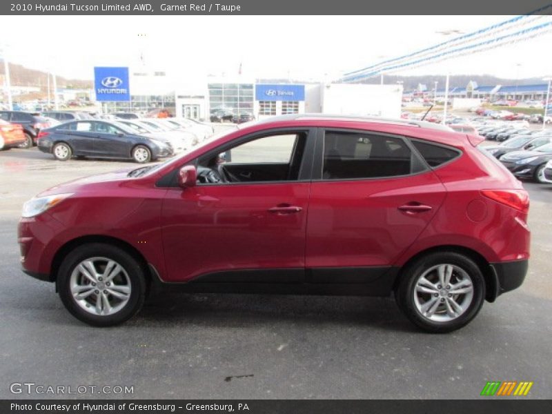 Garnet Red / Taupe 2010 Hyundai Tucson Limited AWD