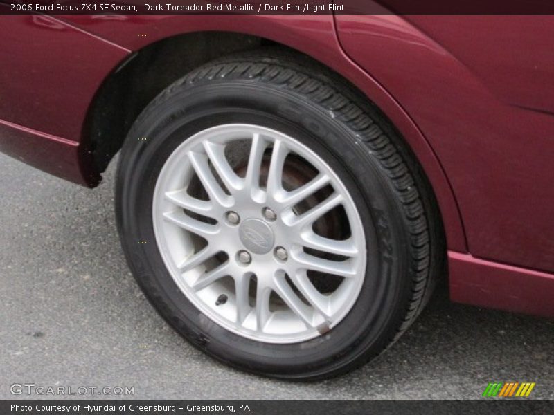 Dark Toreador Red Metallic / Dark Flint/Light Flint 2006 Ford Focus ZX4 SE Sedan