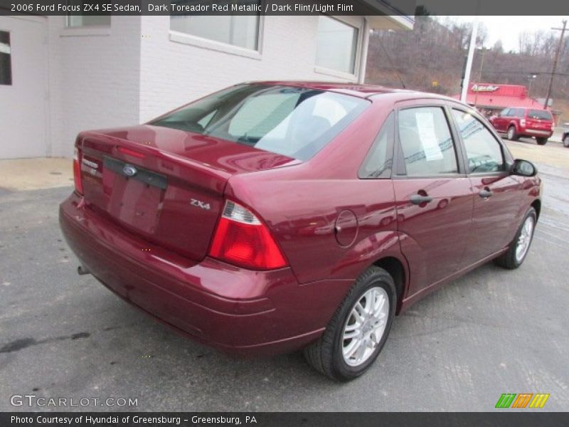 Dark Toreador Red Metallic / Dark Flint/Light Flint 2006 Ford Focus ZX4 SE Sedan