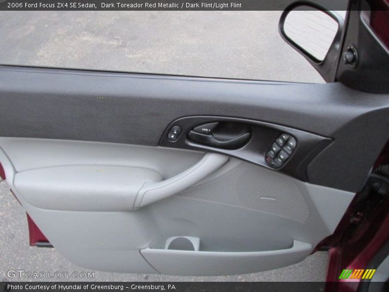Dark Toreador Red Metallic / Dark Flint/Light Flint 2006 Ford Focus ZX4 SE Sedan