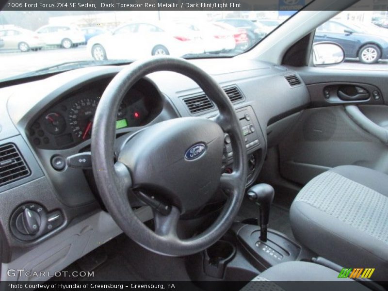 Dark Toreador Red Metallic / Dark Flint/Light Flint 2006 Ford Focus ZX4 SE Sedan