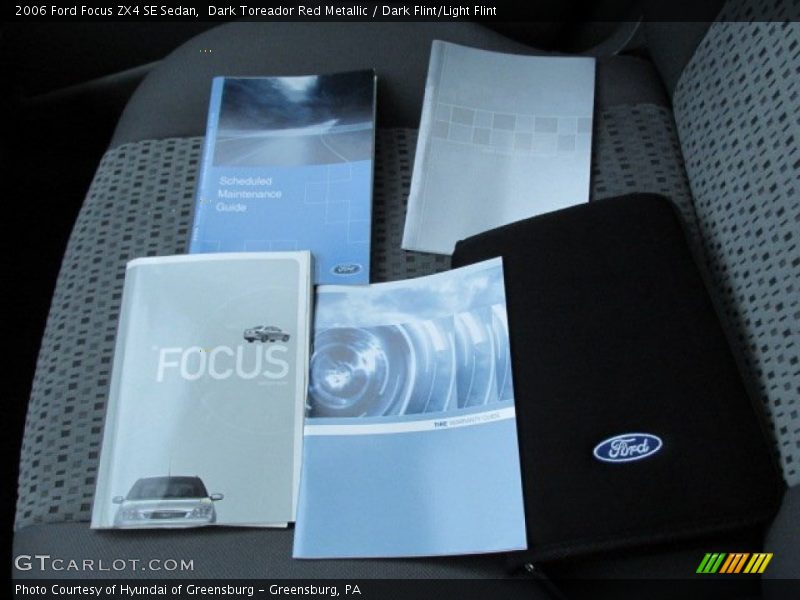 Dark Toreador Red Metallic / Dark Flint/Light Flint 2006 Ford Focus ZX4 SE Sedan