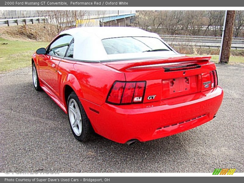 Performance Red / Oxford White 2000 Ford Mustang GT Convertible