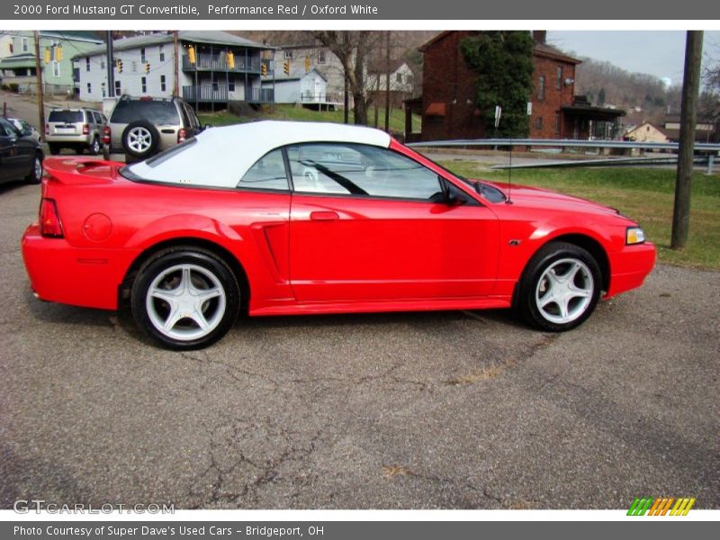 Performance Red / Oxford White 2000 Ford Mustang GT Convertible