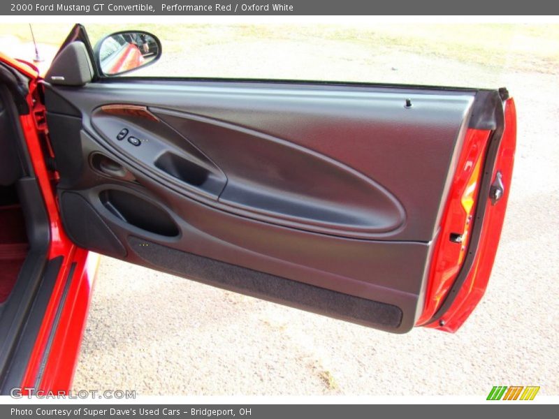 Performance Red / Oxford White 2000 Ford Mustang GT Convertible
