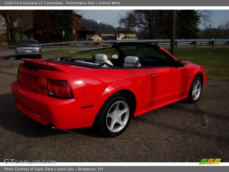 Performance Red / Oxford White 2000 Ford Mustang GT Convertible