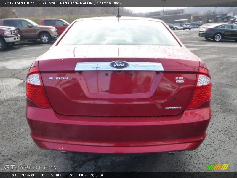 Red Candy Metallic / Charcoal Black 2012 Ford Fusion SEL V6 AWD