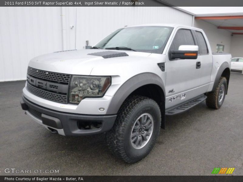 Front 3/4 View of 2011 F150 SVT Raptor SuperCab 4x4