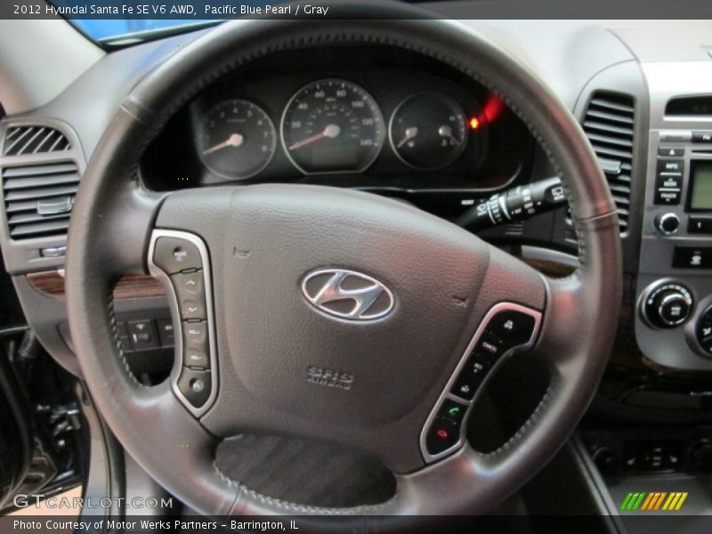 Pacific Blue Pearl / Gray 2012 Hyundai Santa Fe SE V6 AWD