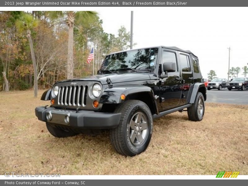 Black / Freedom Edition Black/Silver 2013 Jeep Wrangler Unlimited Oscar Mike Freedom Edition 4x4