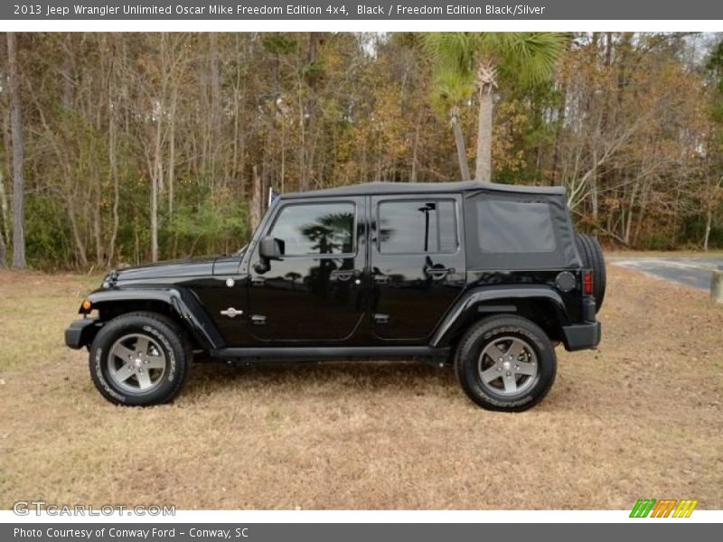 Black / Freedom Edition Black/Silver 2013 Jeep Wrangler Unlimited Oscar Mike Freedom Edition 4x4