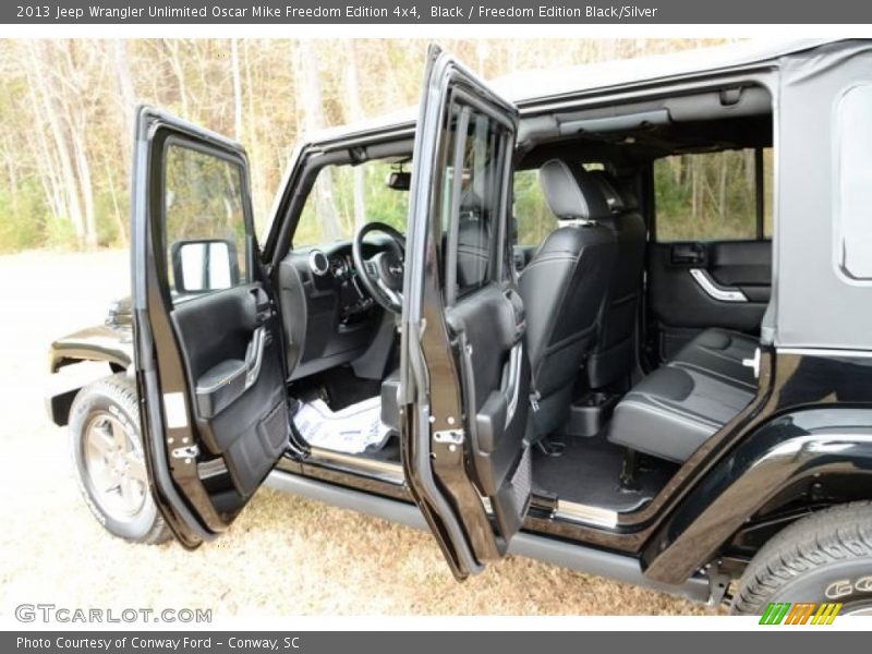 Black / Freedom Edition Black/Silver 2013 Jeep Wrangler Unlimited Oscar Mike Freedom Edition 4x4
