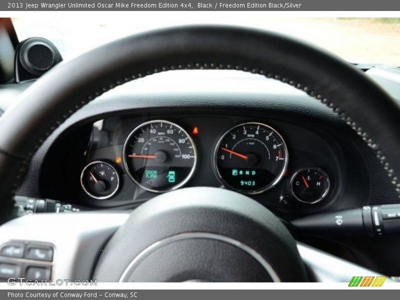 Black / Freedom Edition Black/Silver 2013 Jeep Wrangler Unlimited Oscar Mike Freedom Edition 4x4