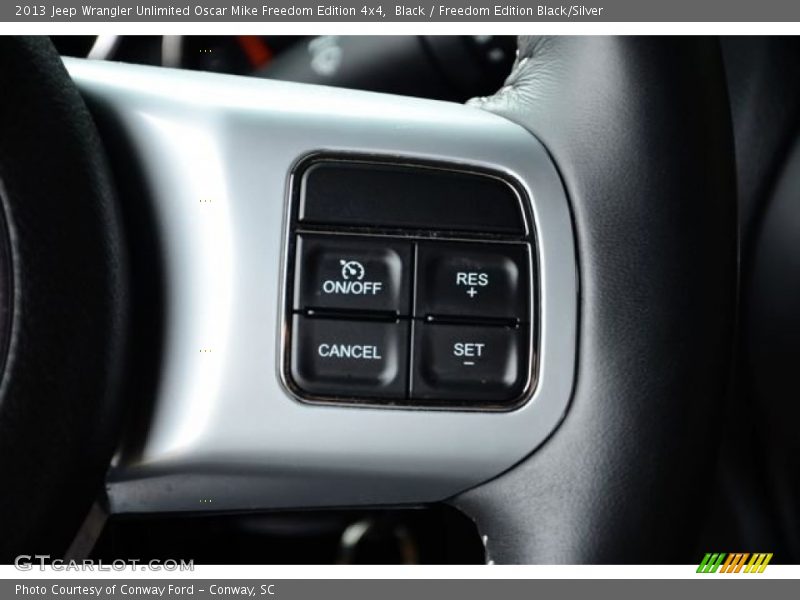 Black / Freedom Edition Black/Silver 2013 Jeep Wrangler Unlimited Oscar Mike Freedom Edition 4x4