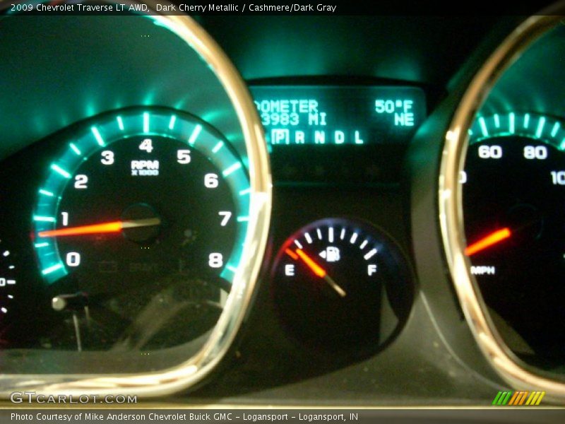 Dark Cherry Metallic / Cashmere/Dark Gray 2009 Chevrolet Traverse LT AWD