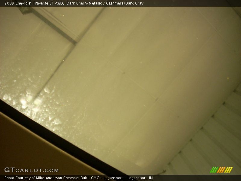 Dark Cherry Metallic / Cashmere/Dark Gray 2009 Chevrolet Traverse LT AWD