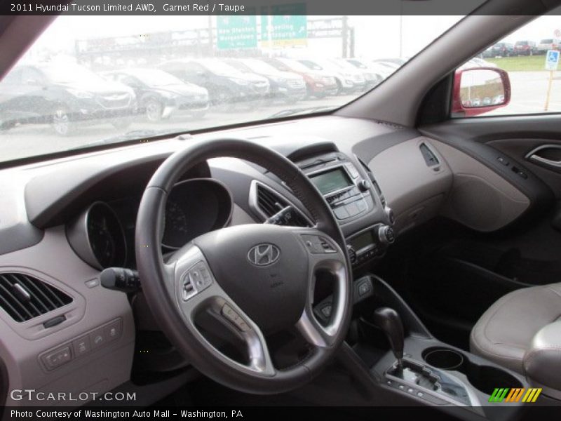 Garnet Red / Taupe 2011 Hyundai Tucson Limited AWD